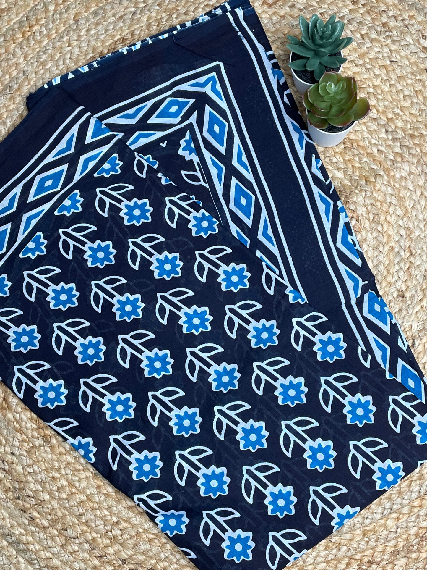Black Mulmul Saree with Blue Flowers