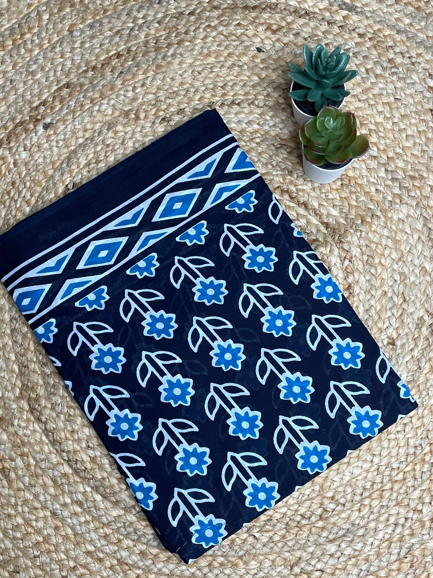 Black Mulmul Saree with Blue Flowers